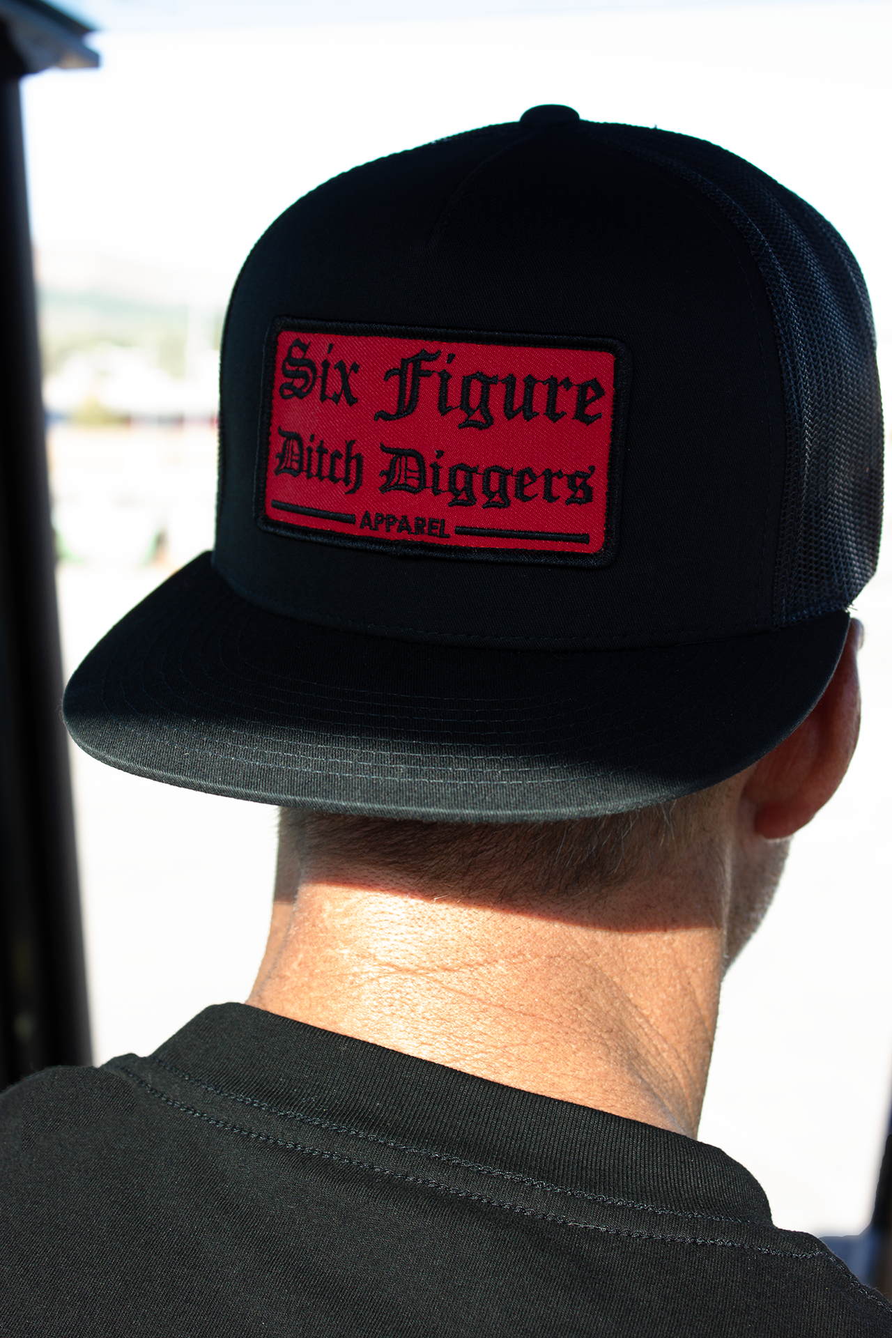 Red Patch Six Figure Flat Bill Trucker Hat